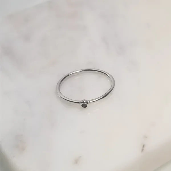 Ring with small stone