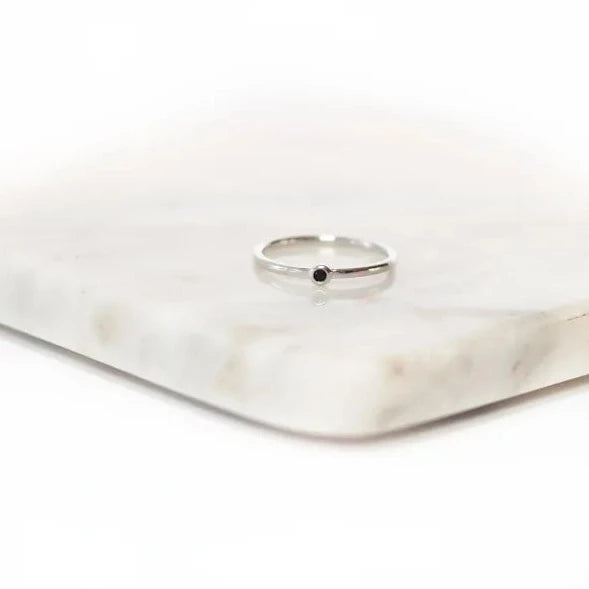 Ring with small stone
