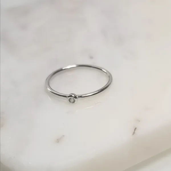 Ring with small stone