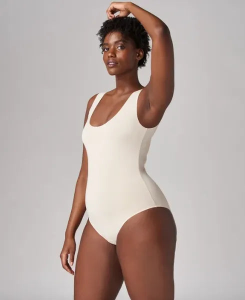 Absorbent seamless bodysuit