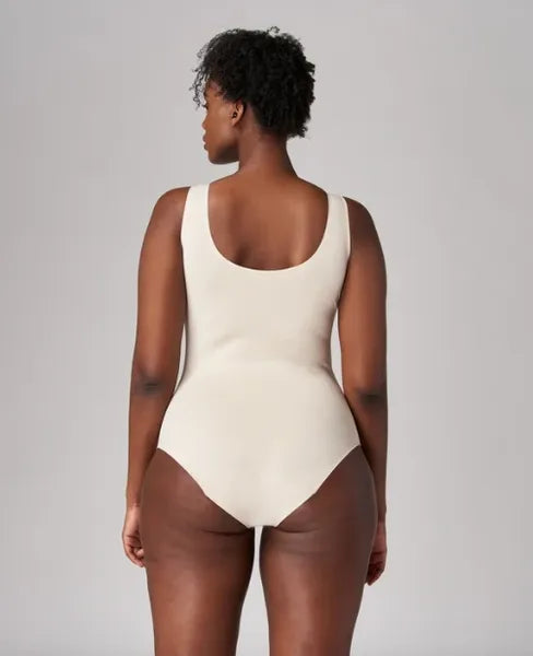 Absorbent seamless bodysuit